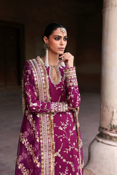 Close-up of the hand embellished keyhole neckline with mirror work and crystal detailing on the Heer luxury Pakistani designer dress.
