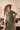 Luxury sage green formal dress by Waqas Shah Official with hand embroidered floral motifs, premium fabric, and timeless Pakistani designer elegance.