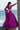 Lyric magenta bridesmaid lehenga choli with the net dupatta flowing in the breeze, Pakistani luxury formal wear