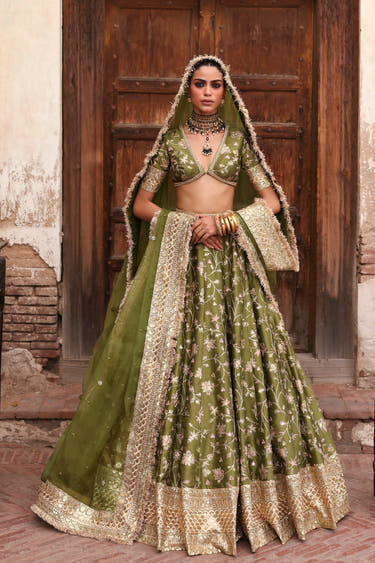 Mahira olive green Pakistani mehndi bridal lehenga choli, full front view with golden tilla embroidery and organza dupatta