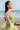 Mint Bloom mint green mayon lehenga choli, seated portrait showing the beaded sleeve borders