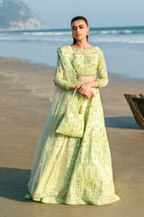 Mint Bloom mint green Pakistani bridal lehenga choli, full front view on the beach with sequin embroidered skirt and net dupatta
