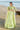 Mint Bloom mint green sequin lehenga with the flared skirt spread out on the beach