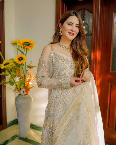 OMAIRAH Off White engagement dress showing hand embellished Organza sleeves by Waqas Shah Official