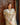 OMAIRAH Off White Nikkah dress with Net dupatta draped over a hand embellished Organza shirt by Waqas Shah Official