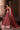 Floral and vine embroidered Pakistani bridal lehenga enhanced with metallic threadwork, shimmering embellishments and mirror accents.
