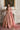 Full-length view of the Primrose heavy rose-gold sequin lehenga with kalidar flare and kangura hem