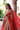 Traditional Red bridal couture Pakistan featuring intricate handcrafted embroidery by Waqas Shah