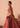 Designer red bridal lehenga choli side view by Waqas Shah
