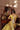 Resham yellow choli back with tassels, reflected in an antique mirror