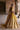Back view of Resham yellow lehenga choli with the dupatta trailing behind