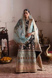Roshanai luxury black Pakistani designer dress by Waqas Shah Official featuring a timeless straight-cut silhouette with intricate multicolor floral embroidery.
