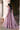 Back view of the Roshni lilac walima gown with sheer embellished back and scalloped dupatta train, Pakistani bridal couture