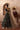 Wide heavily embellished statement border on the Taseer Dark Green Pakistani bridal lehenga creating a regal couture finish.
