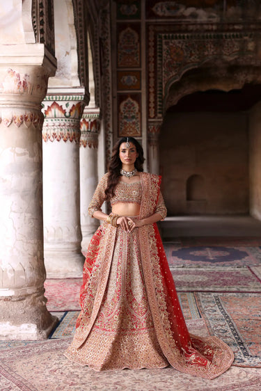 Traditional Red Bridal Lehenga Choli by Waqas Shah with exquisite hand embroidery and luxurious Pakistani bridal craftsmanship