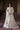 White Beige Bridal Lehenga Choli by Waqas Shah featuring luxurious hand embroidery and elegant Pakistani bridal craftsmanship