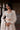 White Beige Pakistani reception dress with handcrafted bridal embroidery by Waqas Shah
