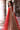 Red net dupatta of the Zarafshan bridal lehenga with sequin motifs and embroidered border by Waqas Shah Official