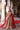 Zarafshan bridal lehenga worn with the red net dupatta as a veil with a trailing train by Waqas Shah Official
