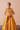 Waist-up view of the Zari choli showing mirror work, golden tilla and zardozi hand embroidery