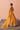 Back view of the Zari mustard yellow mehndi lehenga with the pure organza dupatta and embroidered border