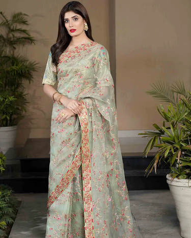 ZARMINY Coral Green Organza saree with Pink border and Jamawar Choli by Waqas Shah Official