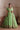 Luxury Pistachio Green Pakistani wedding lehenga featuring premium Raw Silk, floral embroidery, mirror work and an embroidered organza dupatta.
