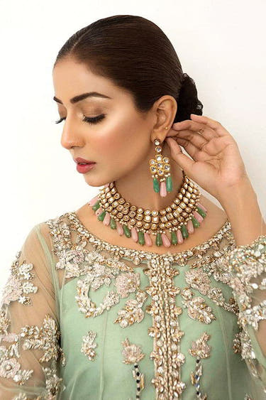 Aqua open front Net Bridal Gown with delicate wildflower and appliqué work by Waqas Shah Official