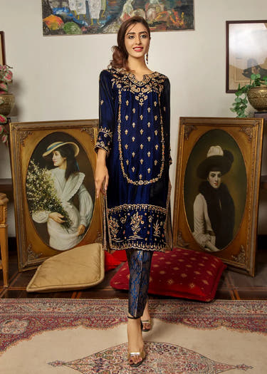 Blue Jamawar trouser paired with a luxurious Velvet formal shirt by Waqas Shah Official