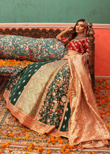 Emerald green and maroon Pakistani Mehndi lehenga choli with Peach Tissue dupatta by Waqas Shah Official