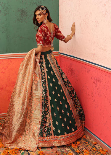 Green and maroon Pakistani Mehndi lehenga with handcrafted embellishment by Waqas Shah Official