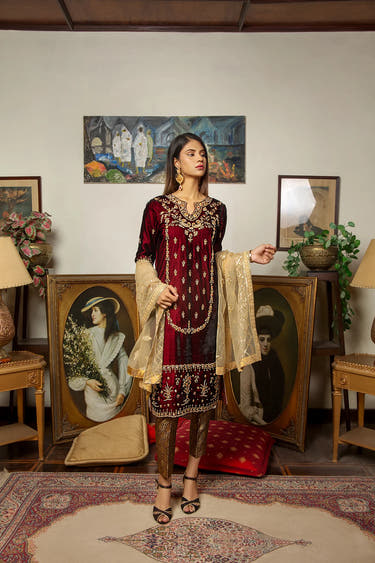 Maroon Jamawar trouser paired with an elegant Net dupatta by Waqas Shah Official