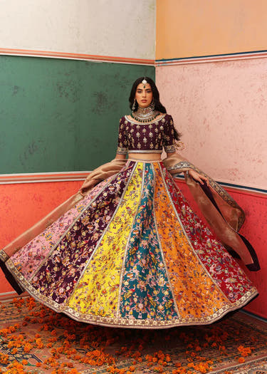 Multicolor Raw Silk Mehndi lehenga with handcrafted embroidery and sequin embellishment by Waqas Shah Official