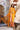 Mustard Pakistani formal dress with colorful handcrafted embellishment and designer detailing by Waqas Shah Official