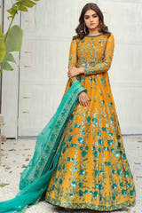 Mustard Net dupatta paired with an elegant Mayon dress by Waqas Shah Official