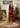 NAZNEEN Maroon Mehndi Dress with embellished Velvet shirt and Net dupatta by Waqas Shah Official