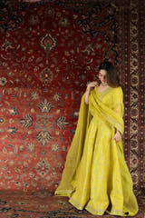 Neon Yellow Mayon lehenga choli with traditional mirror work and handcrafted embellishment by Waqas Shah Official