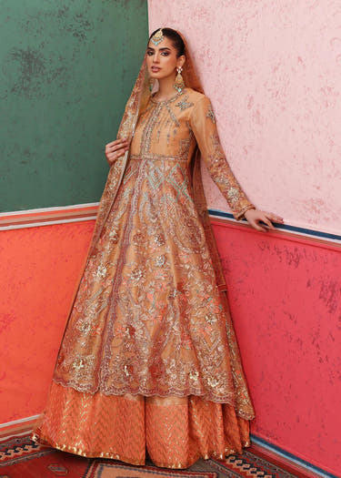 Peach embellished bridal gown paired with a Tissue lehenga by Waqas Shah Official