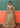 Pistachio Green Pakistani bridal open front gown with Tissue lehenga and Net dupatta by Waqas Shah Official