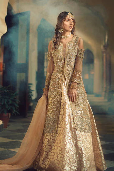 Powder Peach Net shirt with hand embellishment on front back and sleeves by Waqas Shah Official