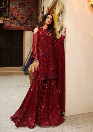 Red net shirt with intricate hand embellishment on front back and sleeves by Waqas Shah Official