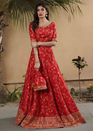 Red Raw Silk Bridal Lehenga with Lotus motifs all-over Jaal stones and beads by Waqas Shah Official